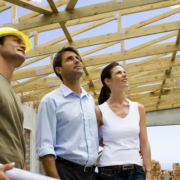 couple talking to custom home builder