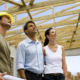 couple talking to custom home builder