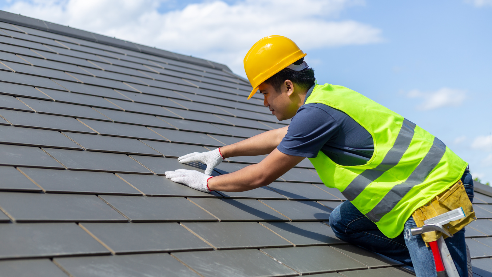 roofing tile being installed